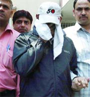 J. K. Verma, a pilot of Air India, who has been arrested for using forged marksheets to procure a licence in New Delhi on Monday. 