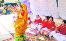 A woman dances to Holi songs at Nainital. 