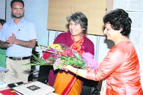 Dr Sushma Arya (right), principal of DAV College for Girls, welcomes participants at a seminar in Yamunanagar
