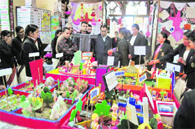 Onlookers at an art and craft exhibition at St Bedes College in Shimla on Monday.