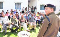 SP, Headquarters, Shailender Singh delivers a lecture to traffic violators in Jammu