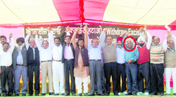 District Congress president Jagmohan Sharma (encircled) at a rally against the Union Government at the Grain Market in Ludhiana