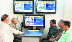  People watch the budget speech of Finance Minister Upinderjit Kaur in Ludhiana
