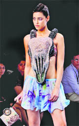 A model flaunts a creation by Jai & Parvesh