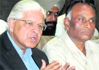 Union Minister of State for Planning and Parliamentary Affairs Ashwani Kumar (left) addresses mediapersons in Amritsar.