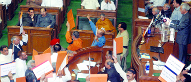 BJP MLAs raise anti-government slogans as LG Tejendra Khanna addresses the Delhi Assembly on Tuesday.