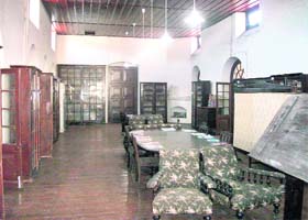 The reading room of the library which still has Victorian age sofas