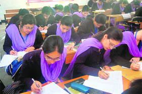B.Ed students appear in a campus placement examination organised by the Shantiyala Education Institute at Rampur near Shimla on Tuesday. 