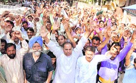 Activists of the Shiv Sena (Bal Thackeray) hold a protest against the CAPD Department at Rani Park in Jammu