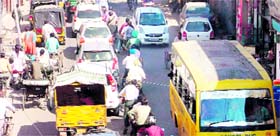 vehicles stuck in a traffic jam in Ludhiana on Tuesday.