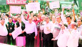 Representatives of the textile industry in Ludhaiana protest against the imposition of 10 per cent excise duty on Tuesday. 