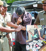 The Columbian burglar in police custody in New Delhi 