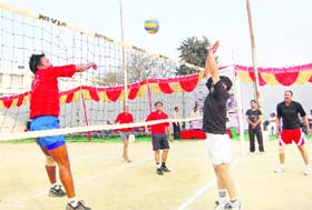 Players in action in the Inter-Departmental Volleyball Tournament of the ONGC in Dehradun