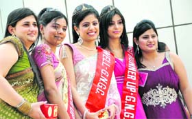 (From left) Miss Elegant Amardeep, second runner-up Gifty Malhotra, Miss Farewell Prangna, first runner-up Mohika and Miss Beautiful Smile Harpreet Chawla strike a pose at Guru Nanak Girls College in Ludhiana on Wednesday.