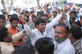 State leaders of the Safai Karamchari Union protest the decision of its Bathinda unit to call off strike