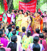 Members of various organisations hold a protest at the Gandhi Park in Dehradun on Thursday.