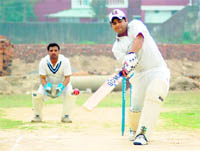 A batsman in action during the final of the Town Cricket Tournament at Clement Town in Dehradun on Thursday. 