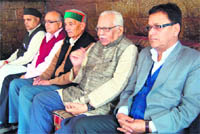 Former Union Minister Ram Naik addresses workers of the BJP at Mussoorie on Thursday. 