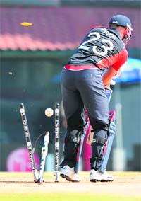 Englands Matt Prior is bowled out by West Indies Andre Russell in Chennai on Thursday.