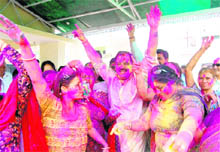 Leader of the Opposition in the Assembly Harak Singh Rawat celebrates Holi with members of the Mahila Congress at his residence in Dehradun on Friday