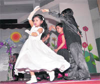 Students perform at an annual function of the Wonder Years school in Dehradun on Thursday.