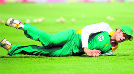 South Africas AB de Villiers dives during a practice session in Dhaka on Friday.