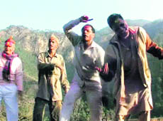 Pithoragarh residents dance during Holi celebrations.