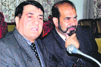 State Chief Information Commissioner GR Sufi (left) addresses mediapersons in Srinagar 
