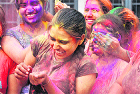 The Holi spirit was all pervasive in Ludhiana on Saturday as girls apply colours to each other.