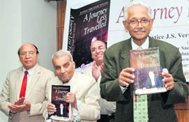 Former CJI JS Verma releases A Journey Less Travelled by Justice Debi Singh Tewatia (L), while Justice Rajinder Sachar (second from left), looks on at a function in New Delhi on Saturday.