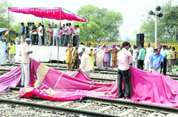 Jats agitating for reservation in jobs remove their tents from the Kafurpur railway station in Amroha on Saturday.