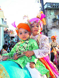 The Holi procession in Hadoti (Rajasthan) concludes with the Badshah (played by children) riding a hathi ki palki