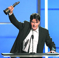 Warner Brothers have ended Charlie Sheen's contract with Two and a Half Men after a fallout