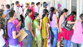 A long queue of students at Panjab University inquiry counter on Monday.
