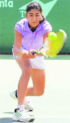 Victoria Chahal plays a shot in a match during the CLTA-AITA Super Series Tennis Tournament in Chandigarh on Monday.