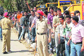 A long queue of cricket fans to buy tickets of the semifinal match of the ICC Cricket World Cup in Chandigarh on Monday.