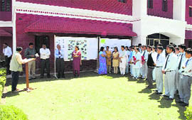 Students of Dolphin (PG) Institute of Biomedical and Natural Sciences take part in a function on  World Forestry Day in Dehradun on Monday.