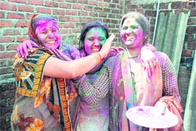 Women celebrate Holi in Dehradun