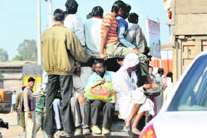 An overloaded tempo in Mewat, near Gurgaon.