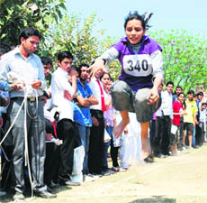 A participant seen in action in the long jump event at JCD Vidyapeeth in Sirsa.