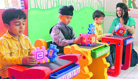 Children play games at Little VIPs Pre-school in Ludhiana.