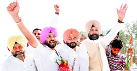 Congress workers welcome Jagmeet Singh Brar at Rajpura on Monday.