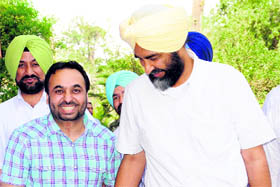 Manpreet Singh Badal along with Bhagwant Mann in Chandigarh on Monday.