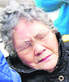 Sumi Abe after she was rescued from her destroyed home in Ishinomaki.