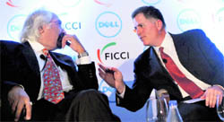 Michael Dell (R), CEO and Founder of Dell Inc with Sam Pitroda, Advisor to Prime Minister on Infrastructure, Innovation and Public Information during FICCI-Dell interactive session in New Delhi on Tuesday.