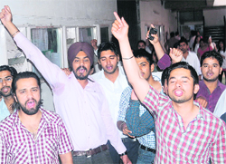 Students of the department of laws protest at Panjab University on Tuesday