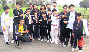 Winners of a speedball championship in jubilant mood in Kathua.