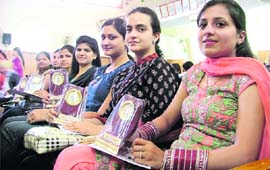 Students are all smiles after receiving prizes at SCD Government College in Ludhiana on Tuesday.