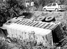 The truck that hit a stationary truck (below) and a motorcycle on the Ramgarh-Panchkula highway near the Chandimandir police station on Wednesday