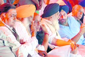 (From left) Manoranjan Kalia, Sukhdev Singh Dhindsa, Rajnath Singh, Parkash Singh Badal, Sukhbir Badal and Shanta Kumar during a rally at Khatkar Kalan